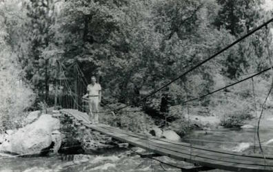 People posing with bridges