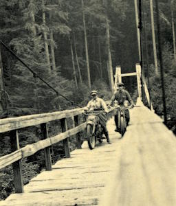 People posing with bridges