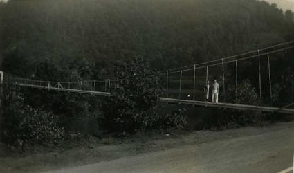 People posing with bridges